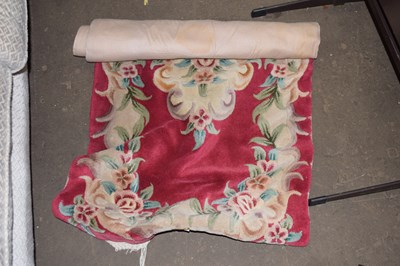 Lot 879 - Raspberry pink Chinese style rug