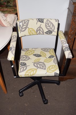 Lot 895 - An upholstered swivel office chair
