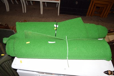 Lot 326 - Two part rolls of green fabric