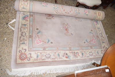 Lot 335 - A Chinese washed wool carpet decorated with a...