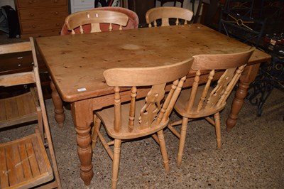 Lot 341 - A modern pine kitchen table and four beech...