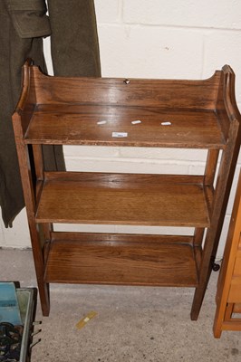 Lot 365 - An Edwardian light oak three tier bookcase