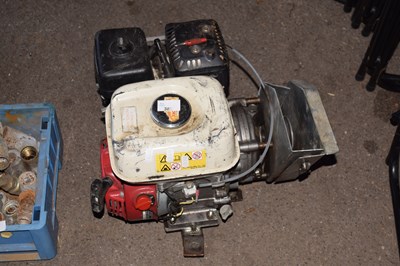 Lot 382 - A petrol engine with pulley attachment