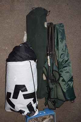 Lot 384 - A sleeping bag and folding camping chairs