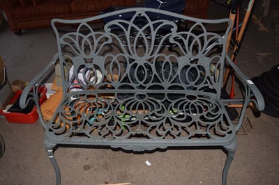 Lot 392 - A cast aluminium garden bench