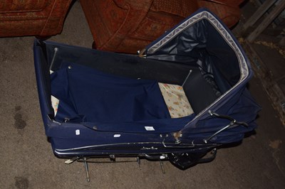 Lot 397 - A vintage pram with hood