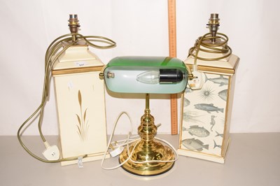 Lot 537 - A pair of lamp stands together with a green...