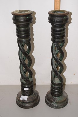 Lot 551 - A pair of large wooden candle holders