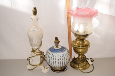 Lot 675 - A reproduction Chinese lamp stand and two others