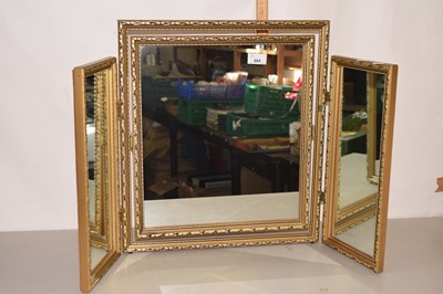 Lot 684 - A gilt framed tryptych table top mirror