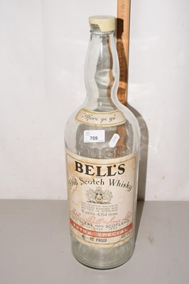 Lot 709 - A large empty Bells Scotch Whisky bottle