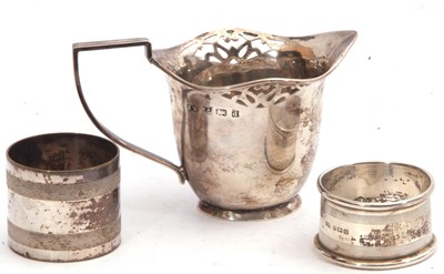 Lot 15 - Edward VII silver cream jug, helmet shaped...