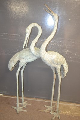 Lot 485 - A pair of 20th Century verdigris finish garden...