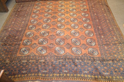 Lot 488 - A 20th Century Afghan wool floor rug decorated...