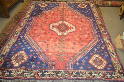 Lot 490 - A large 20th Century Turkish wool floor rug...
