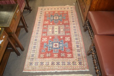 Lot 491 - A small Middle Eastern wool floor rug...