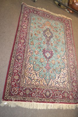 Lot 494 - A small modern Isfhan rug decorated with...