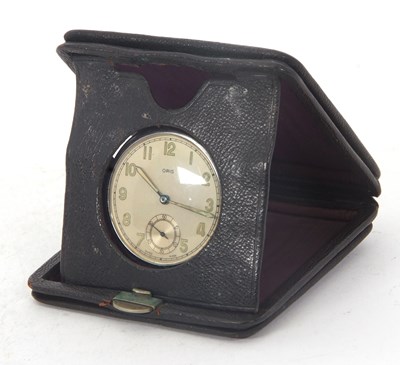 Lot 281 - A metal Oris pocket watch with fitted travel...