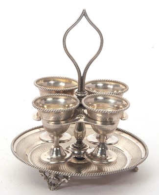 Lot 166 - A Victorian silver egg cruet set having a...