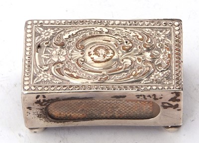 Lot 174 - An Edwardian silver matchbox sleeve, the top...