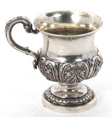 Lot 177 - A silver mug of baluster form upon a...