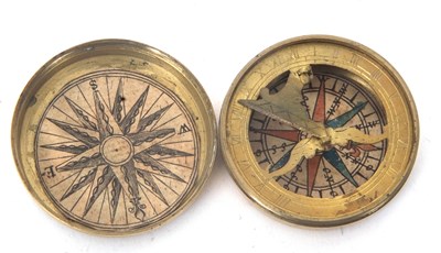 Lot 135A - A vintage brass pocket combination compass...