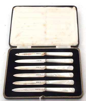 Lot 210 - A cased set of six silver bladed and mother of...