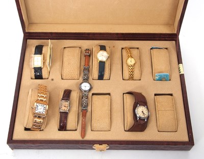 Lot 324 - Mixed Lot:  A watch case and seven watches,...