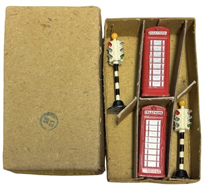 Lot 147 - A pair of Dinky 12C Telephone boxes together...