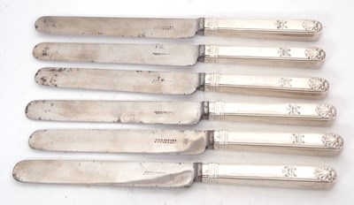 Lot 215 - A set of six Georgian silver handled table...