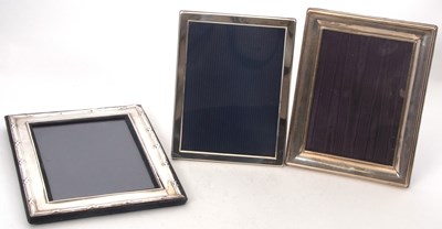 Lot 235 - A group of three silver mounted photograph...