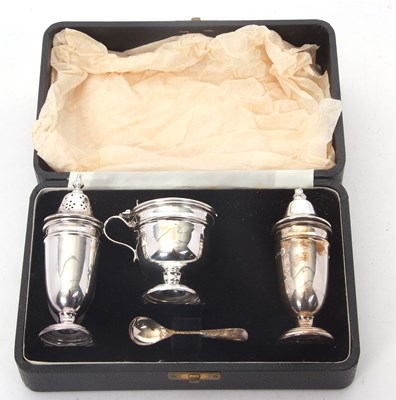 Lot 238 - Cased three piece hallmarked silver condiment...