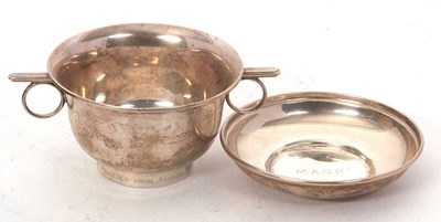 Lot 244 - A cased George V silver twin ring handled bowl...