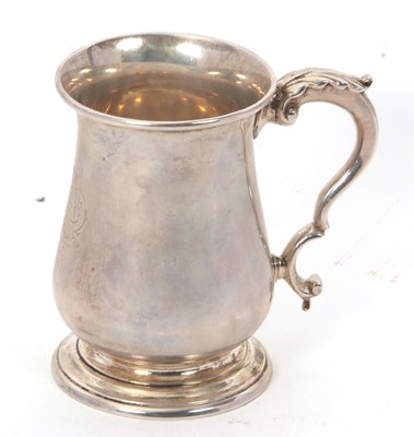 Lot 84 - George V silver mug of baluster form having a...