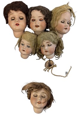 Lot 353 - A group of German bisque dolls heads with hair