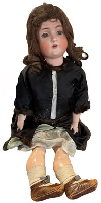 Lot 335 - A large Bruno Schmidt bisque head doll with...