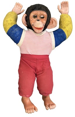 Lot 383 - A vintage rubber chimpanzee with blinking eyes