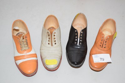 Lot 79 - Four small ceramic Shoe models