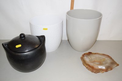 Lot 187 - Two large plant pots, polished stone ashtray...