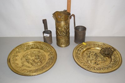 Lot 189 - Pressed brass plates, jug and measures