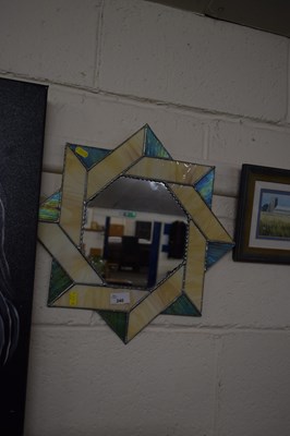 Lot 240 - Modern wall mirror in a star shaped frame