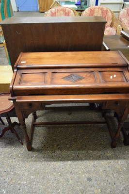 Lot 302 - Reproduction oak desk with green leather...