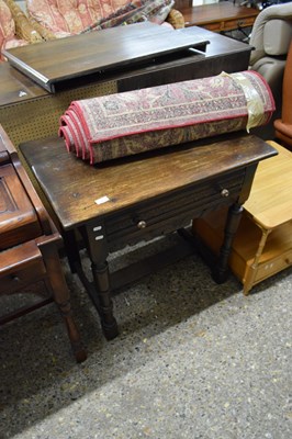 Lot 303 - Reproduction oak side table with carved...