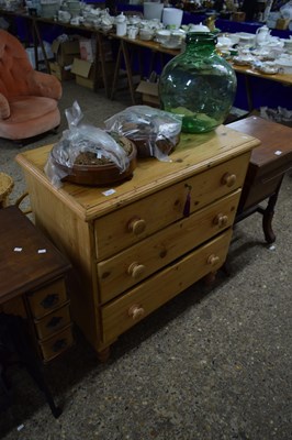 Lot 312 - Pine three drawer chest with turned knob handles