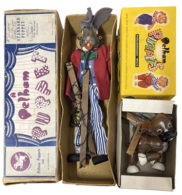 Lot 376 - A pair of boxed Pelham puppets to include...