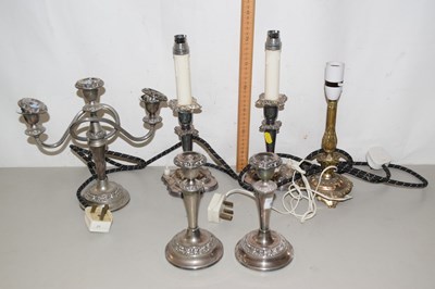 Lot 501 - Silver plated candle sticks and table lamps