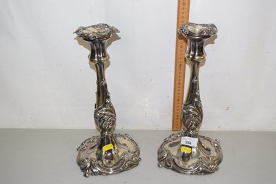 Lot 554 - Pair of large silver plated candle sticks