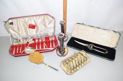 Lot 556 - Various cased cutlery, candle sticks, toast...