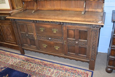 Lot 322 - Late 19th century oak dresser, the top section...