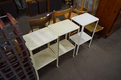 Lot 750 - Set of three white lamp tables